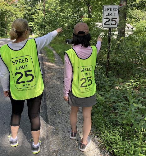 friends wearing 25mph vests